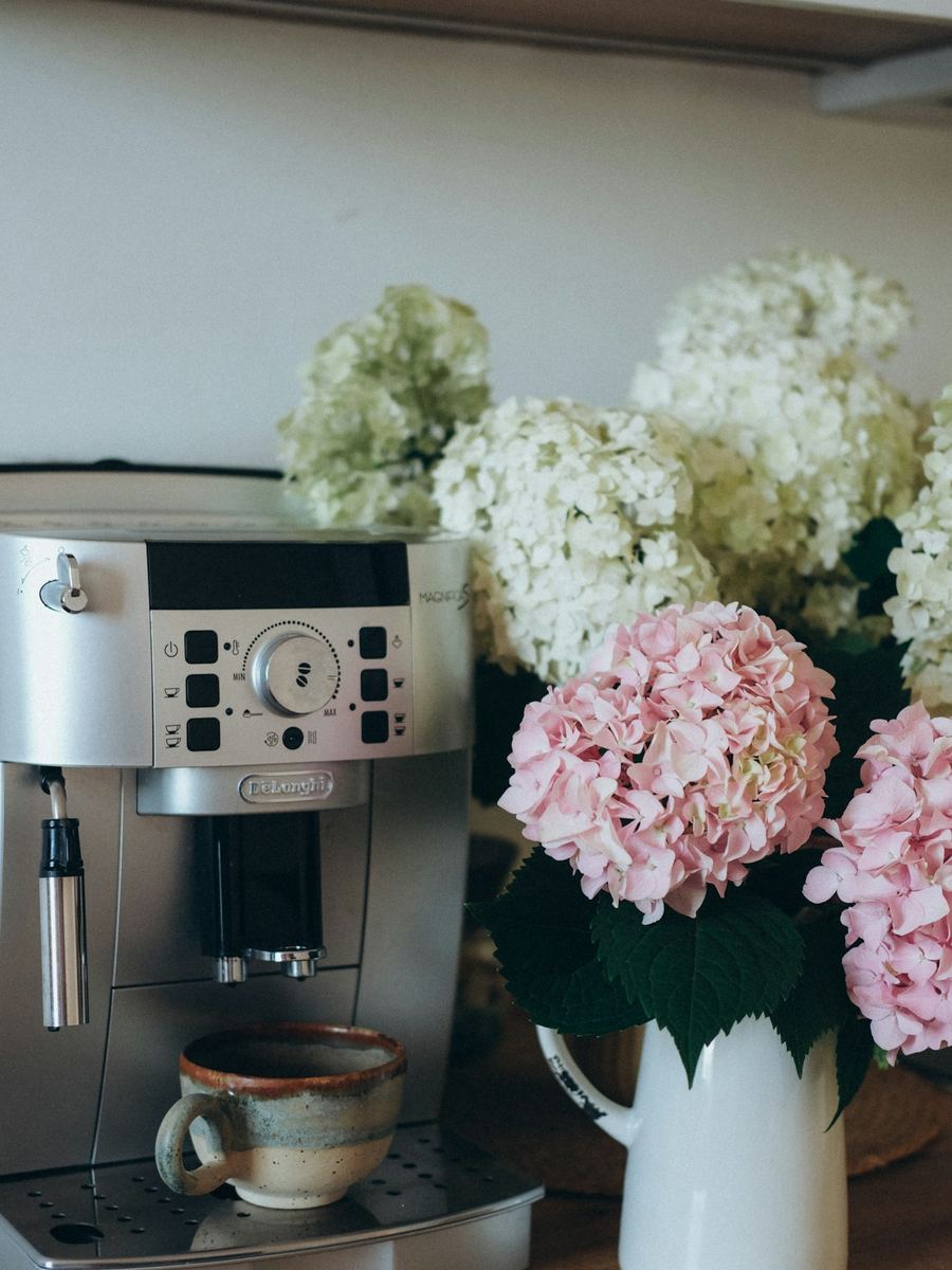 Espressomaschine mit aufgefülltem Verbrauchsmaterial in der Ferienwohnung